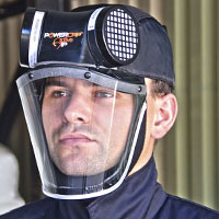 man wearing PAPR powered air purifying respirators-head top unit and face visor which contains the battery, motor unit and filter