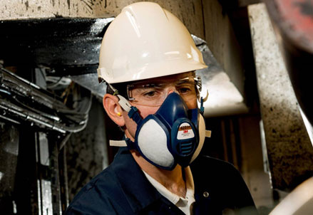 man wearing a semi-disposable mask