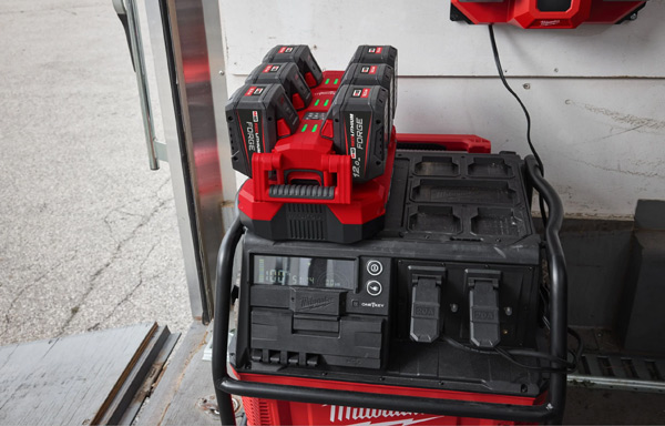 Milwaukee 18V Mobile Packout 6-Bay Rapid Charger on top of a Milwaukee Generator power station